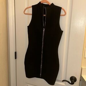 Bebe black body on dress with rhinestone zipper in size small. LBD.
